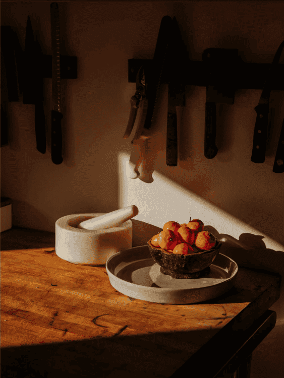 A warm kitchen still life in late afternoon light