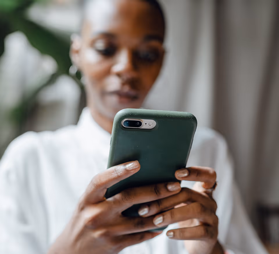 Checking a Practitioner's name against the Official Records on her phone