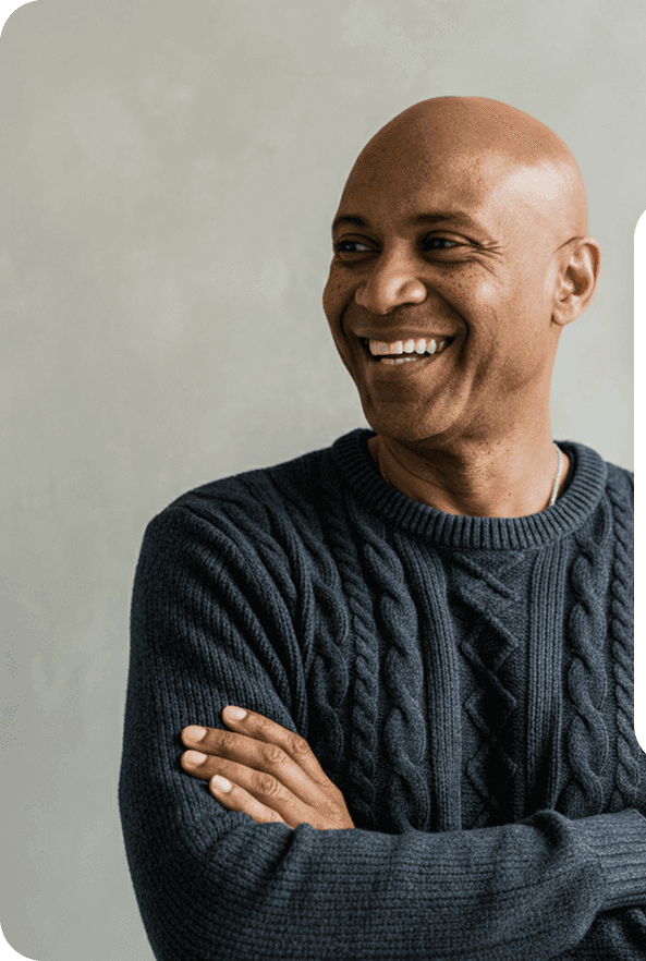 A Practitioner smiling after completing his Heyrafiki onboarding